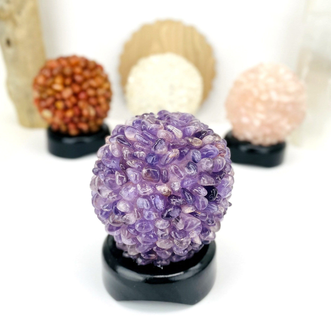 Tumbled Stone Light in amethyst up front and other stone behind