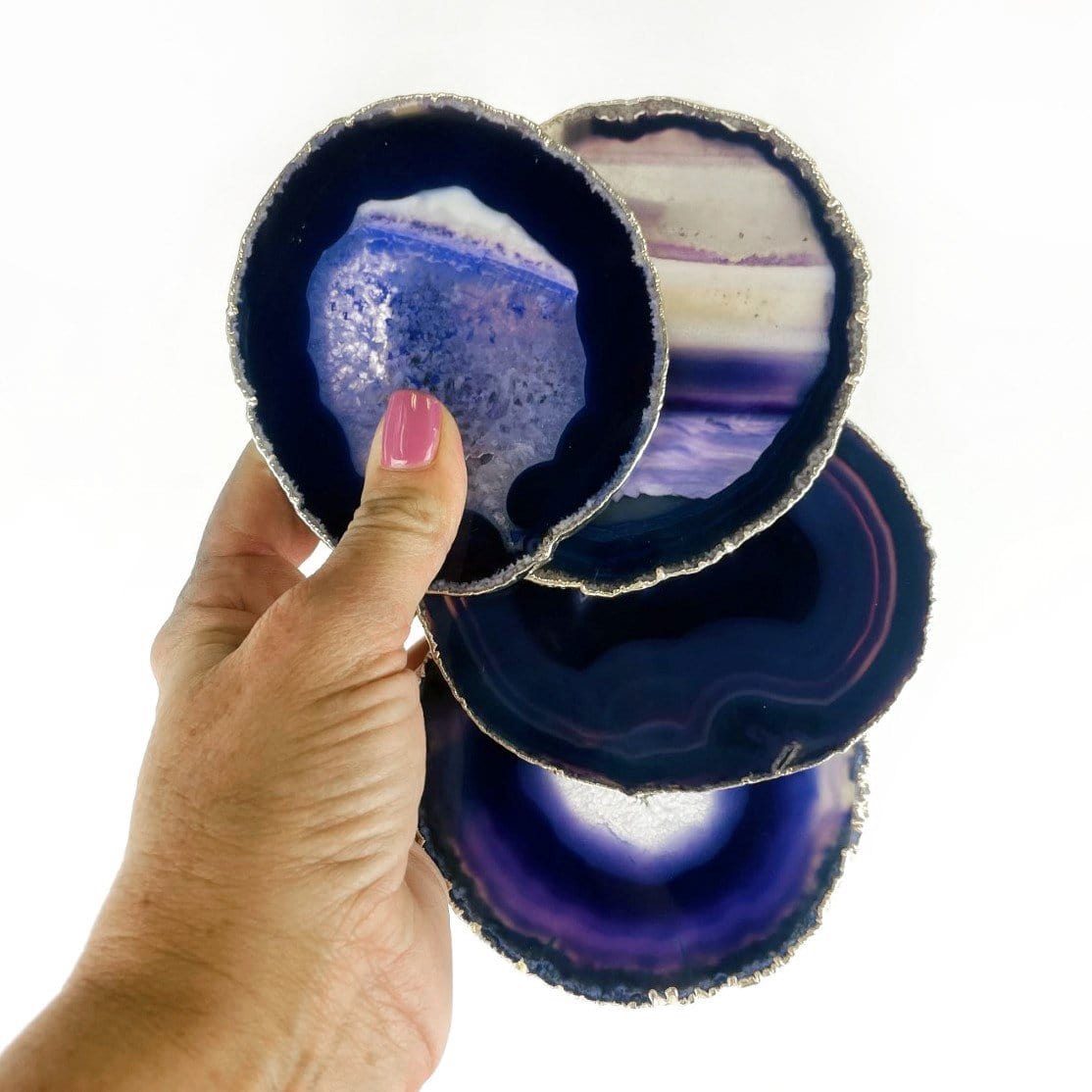 Purple Agate Coasters Set - 24k Gold or Silver Electroplated Edges--coasters in hand with different shapes and tones.