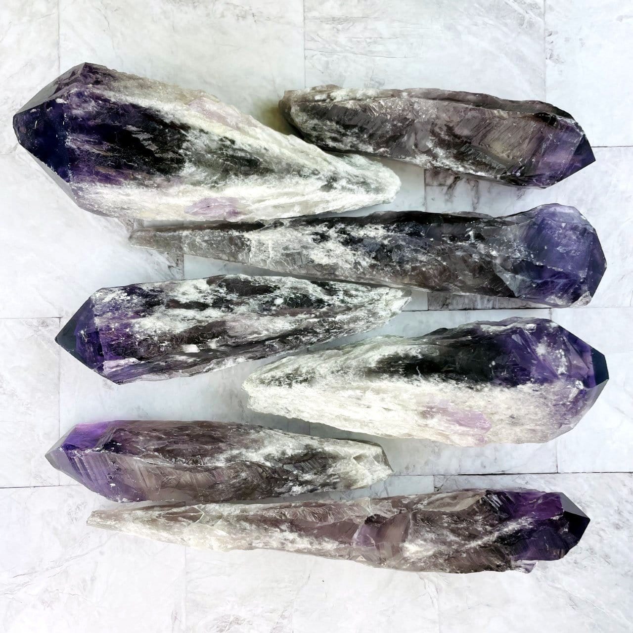 assorted elestial points on a marble background