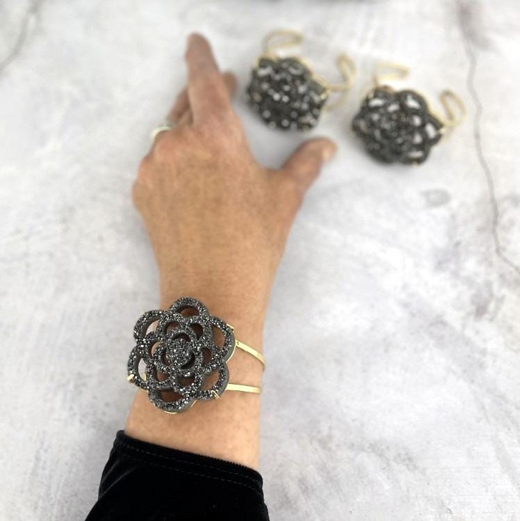 druzy flower cuff on a wrist