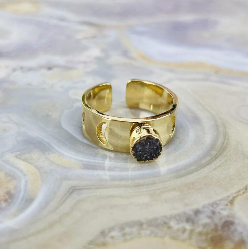 moon phase druzy ring on agate background