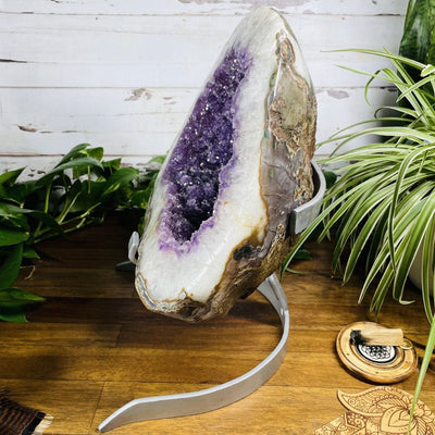 Amethyst Cluster with Calcite Chunk on Metal Stand side view