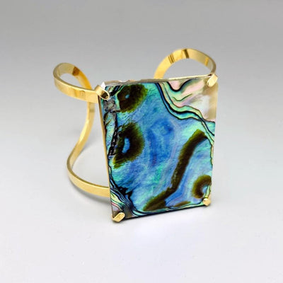 1 Abalone Geometric Cuff in Gold Electroplate displaying the front side.