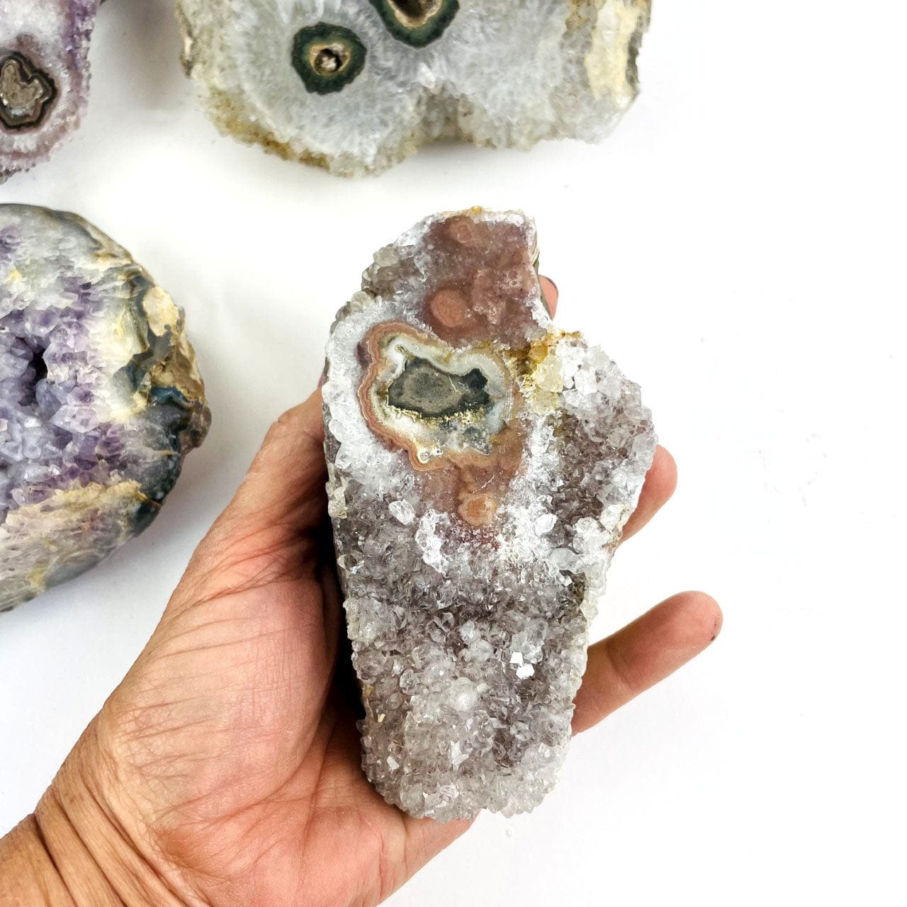  Amethyst Stalactite Druzy Cluster Geode in a hand for size