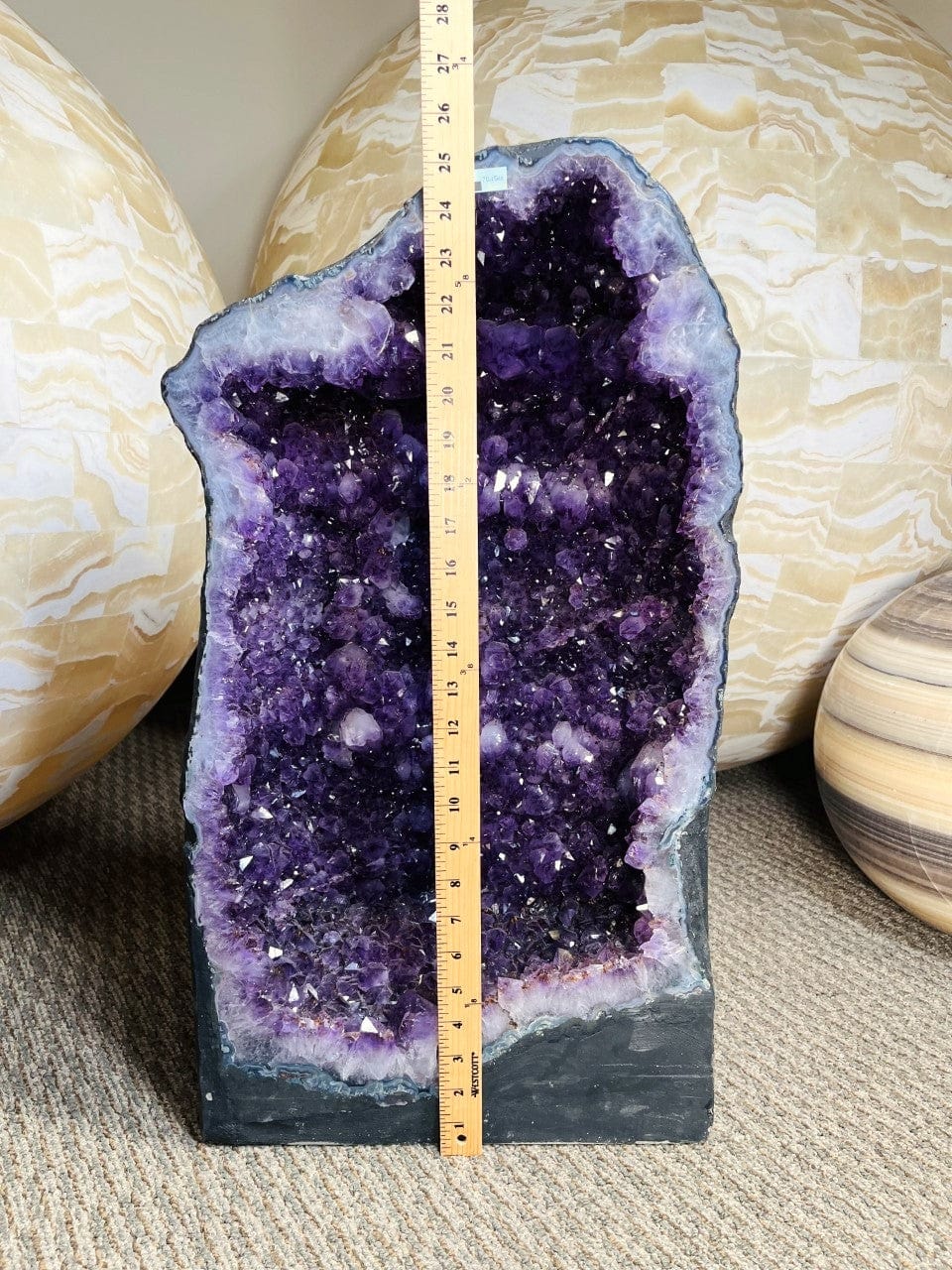 Amethyst Crystal Cathedral Geode with a ruler for size reference