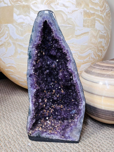 Amethyst Cathedral with Deep Purple Crystals on display