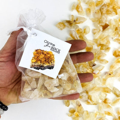 Citrine Stones - Golden Amethyst - Tied & Tagged in an Organza Bag in a hand