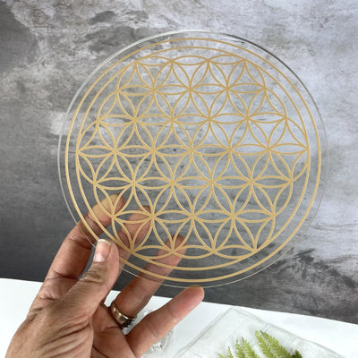 Crystal Grid Flower of Life Acrylic Grid - 2 sided - Gold side in a hand