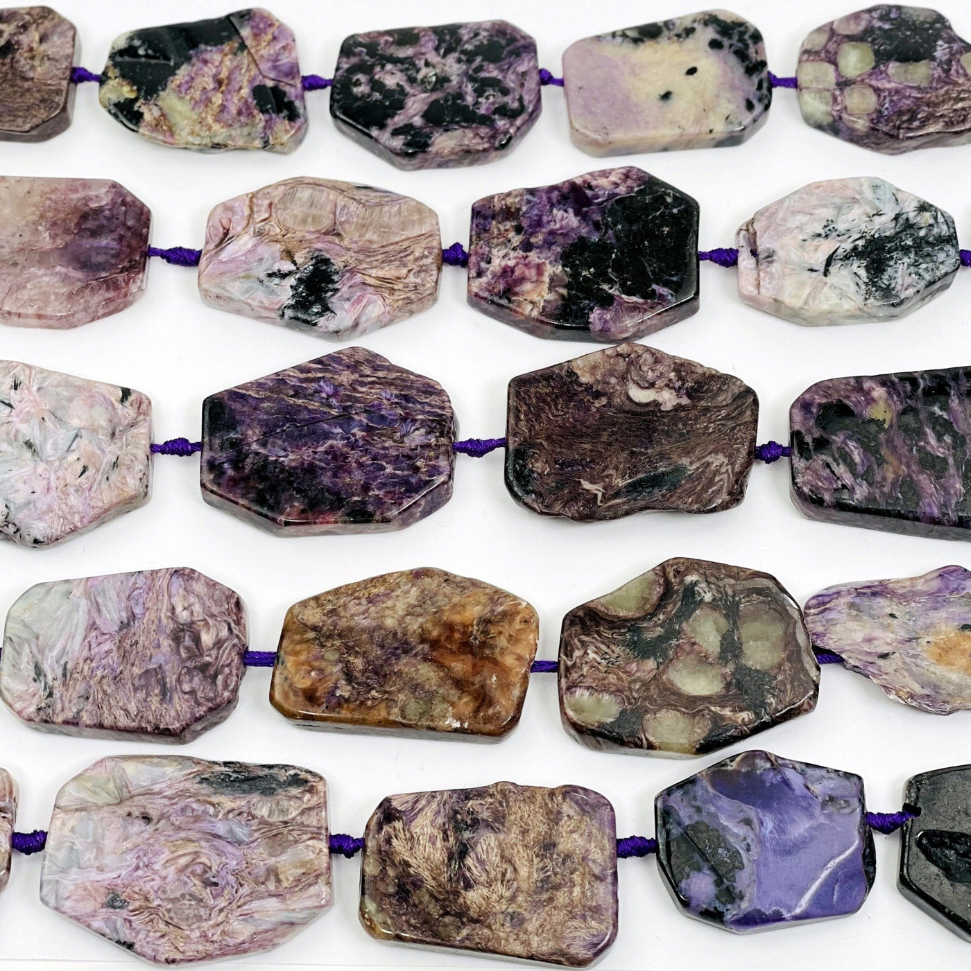 Charoite Slab Beads- close view of multiple tones and shapes. 