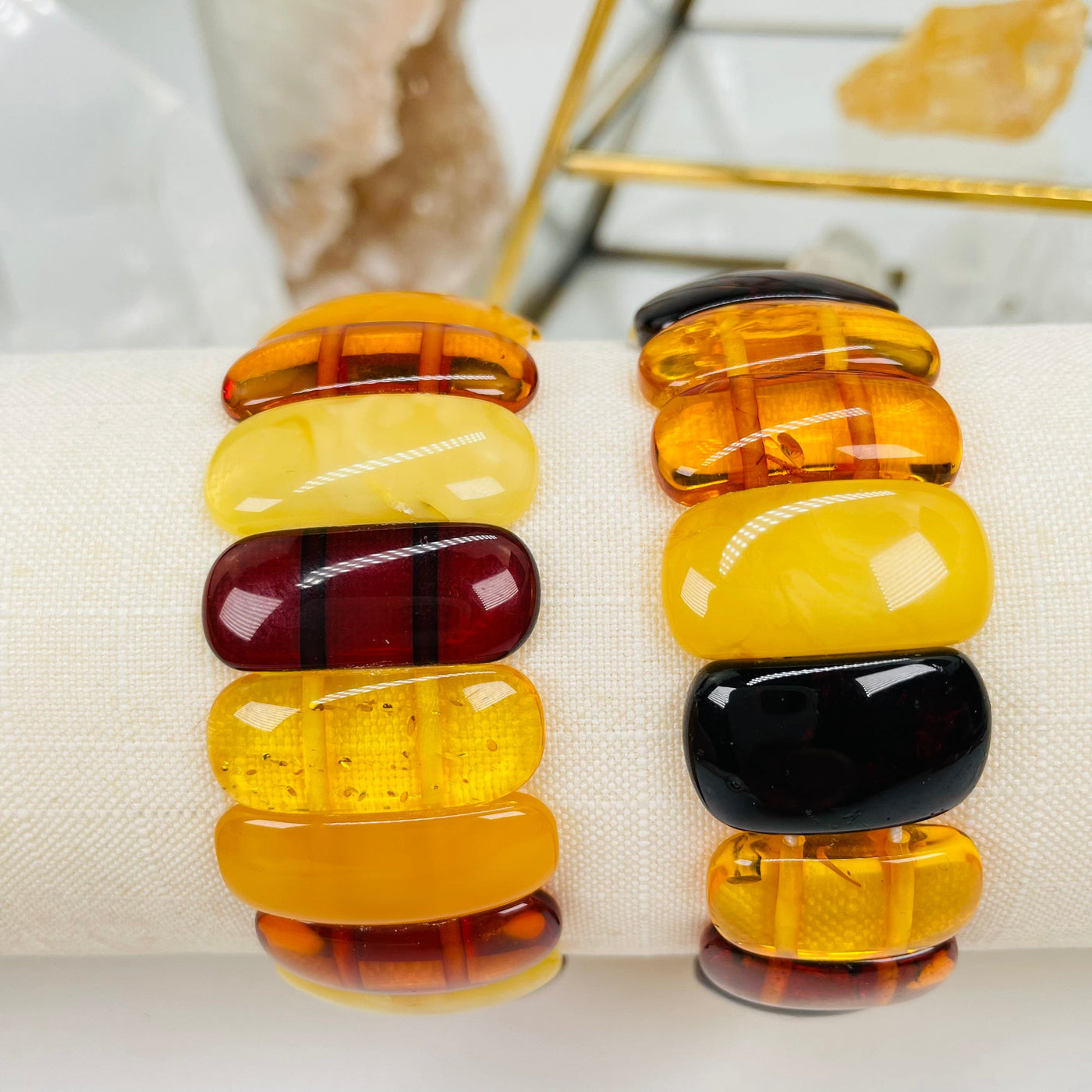 amber bracelets displayed to show the differences in the color shades 
