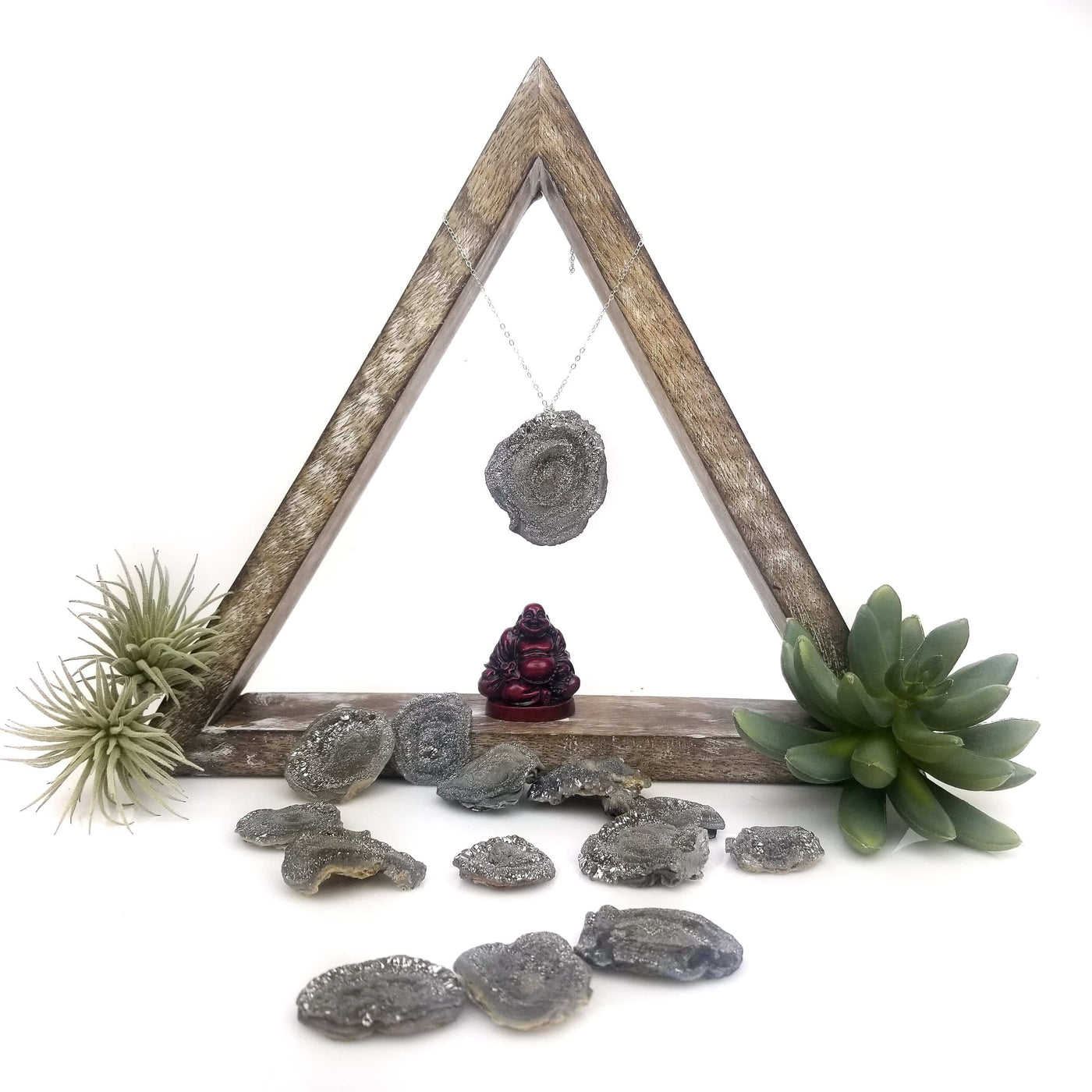 1 Raw Chalcedony Freeform bead on necklace chain hanging on triangular display with other stones on the white table