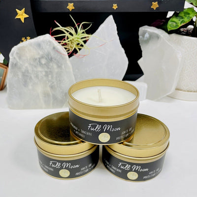 3 Moon Phase Candles with decorations in the background