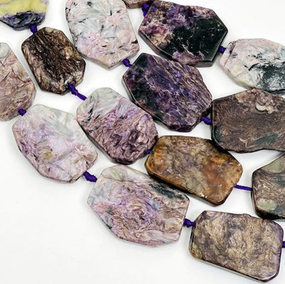 Charoite Slab Beads- close view of shapes and thickness.  