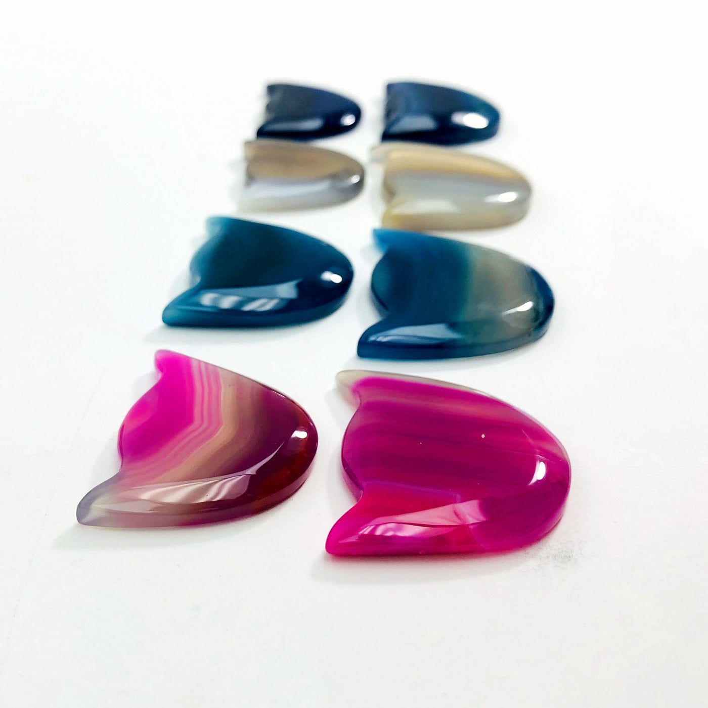 Agate Cats shown at an angle to show thickness approximation.