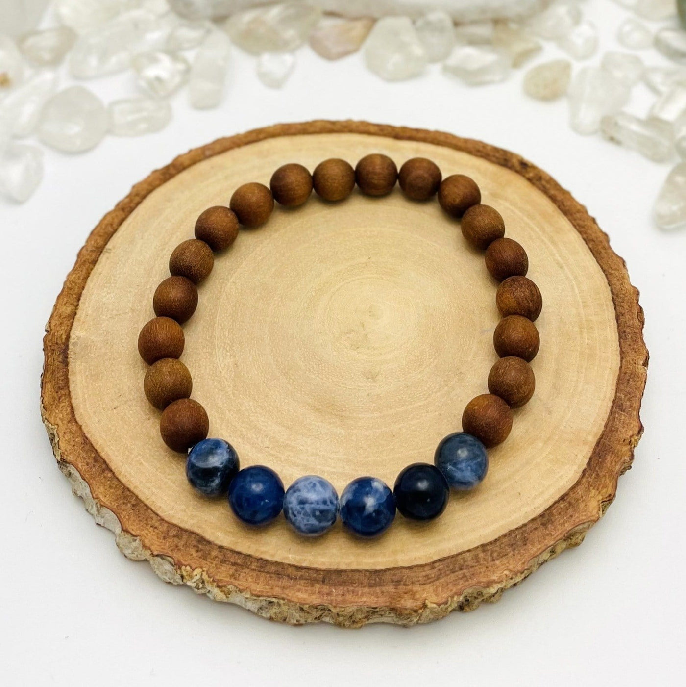 one sandalwood bead bracelet with sodalite for details