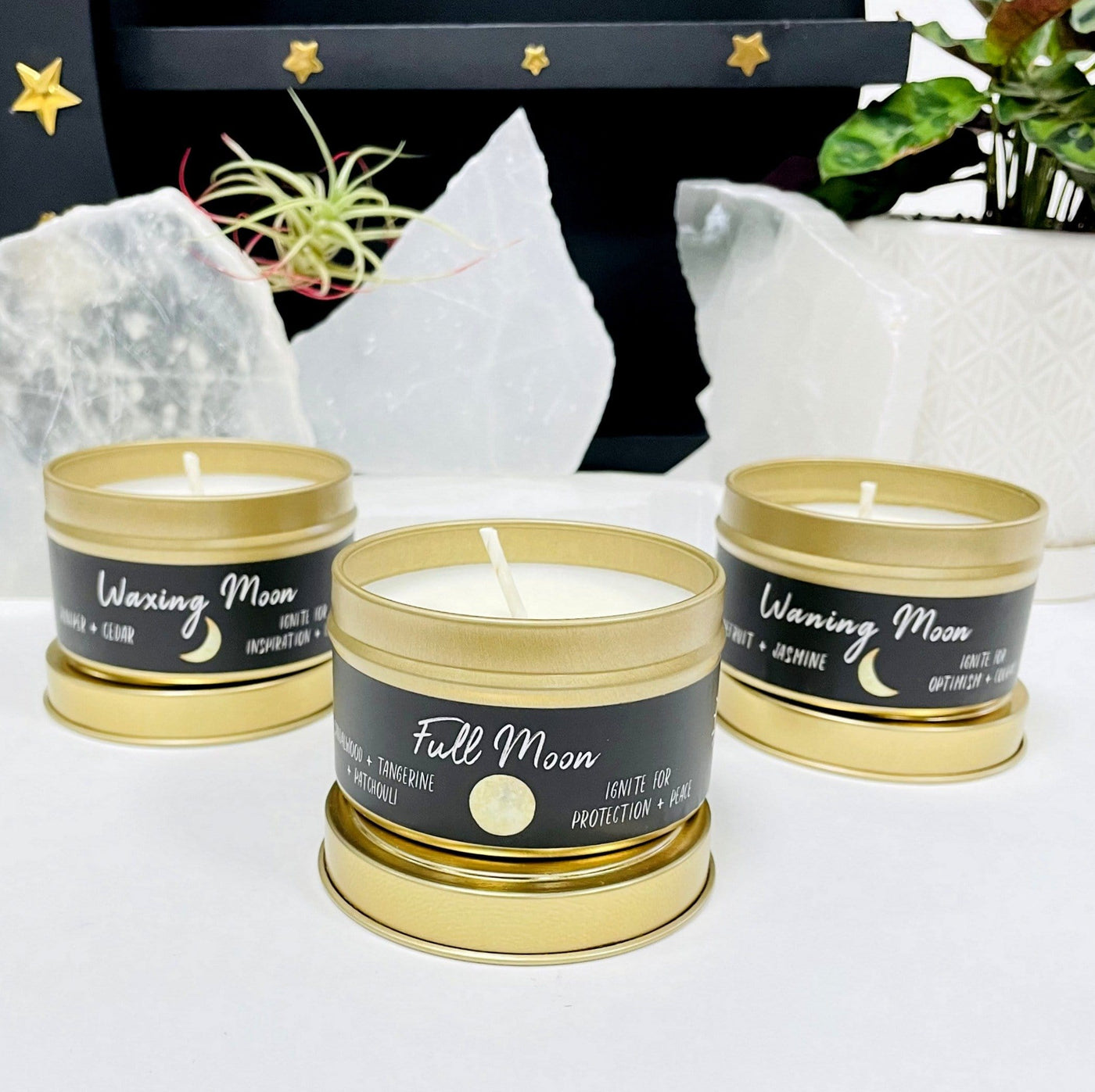 3 Moon Phase Candles with decorations in the background