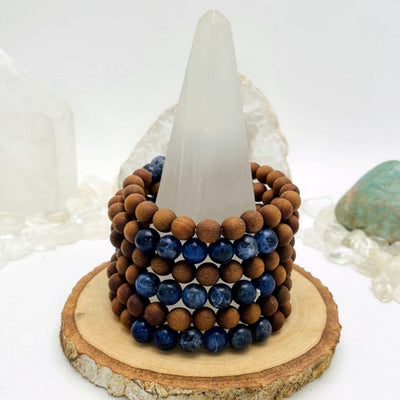 sandalwood bead bracelets with sodalite on display for possible variations