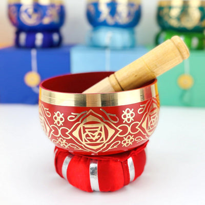 Brass Tibetan Singing Bowls - red bowl on a table