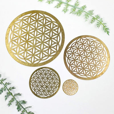 multiple flower of life grids displayed to show the differences in the sizes available 