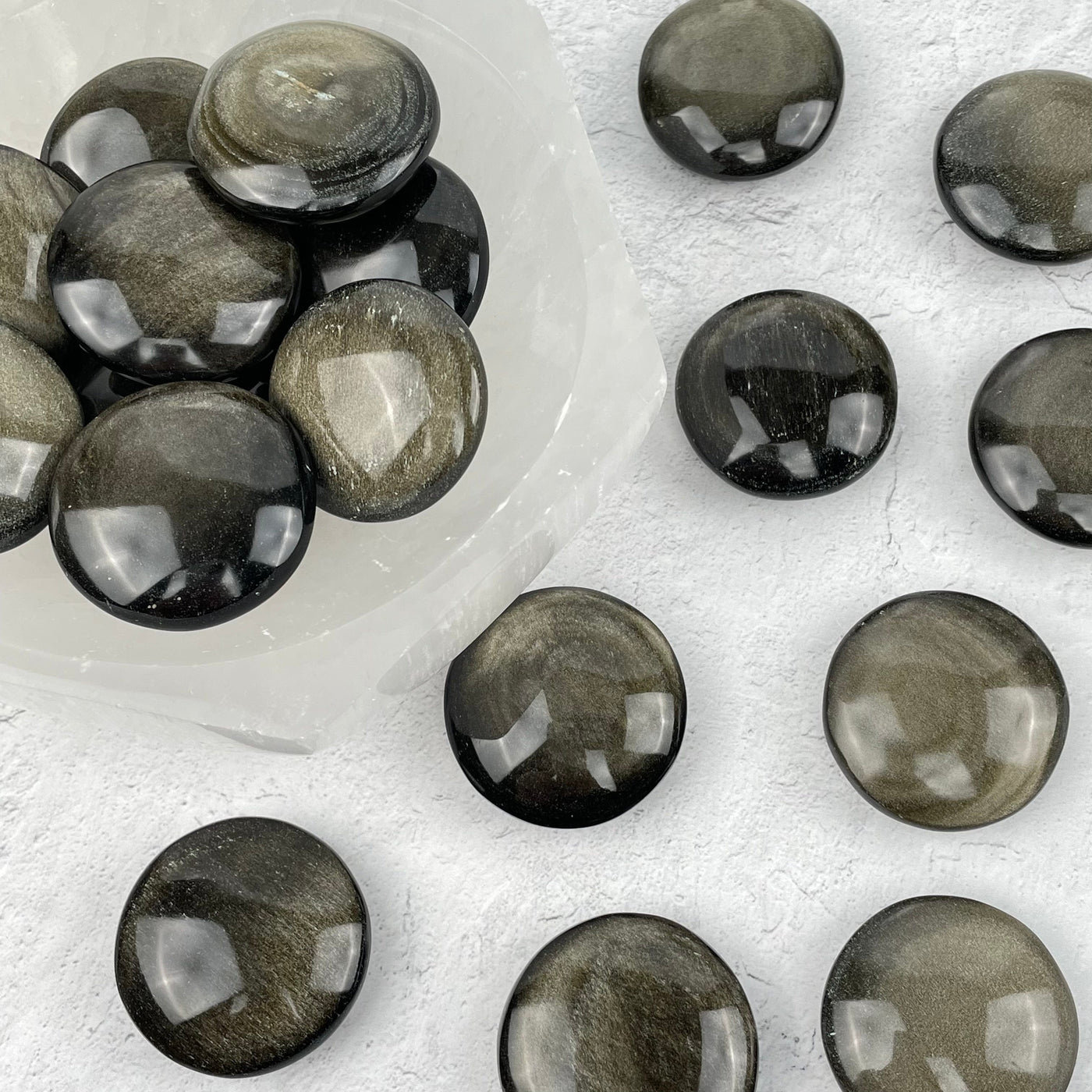 multiple polished stones displayed to show the differences in the color shades and sizes 