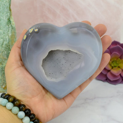 Close up of Agate Druzy Heart - OOAK - (DOOAK-S24-01) in a hand in an alter.
