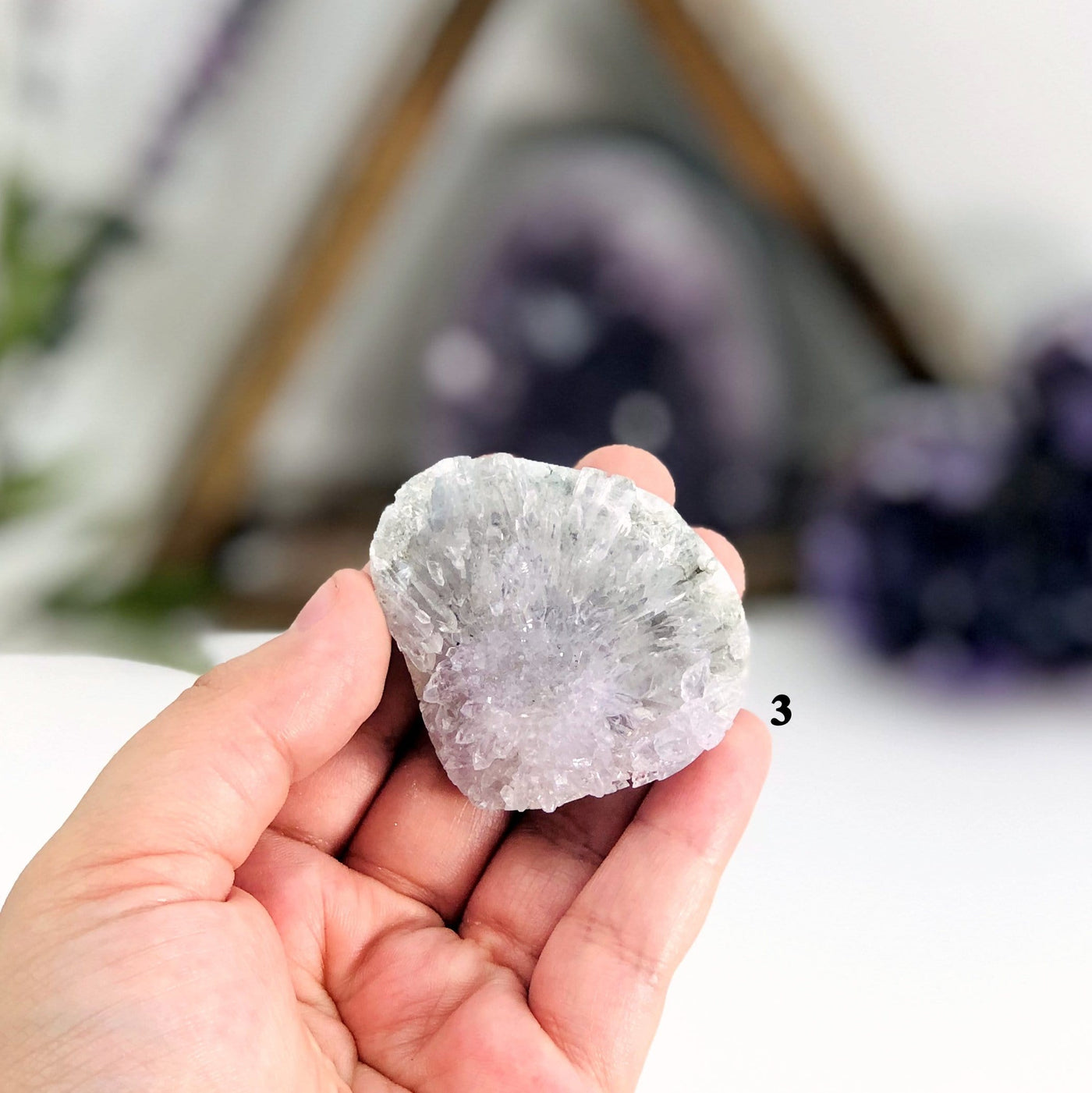 hand holding up variant 3 of Amethyst Flower Crystal Clusters