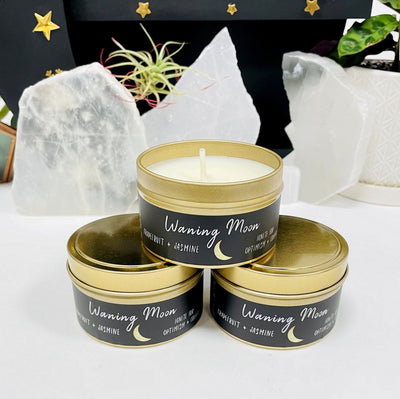 3 Moon Phase Candles with decorations in the background