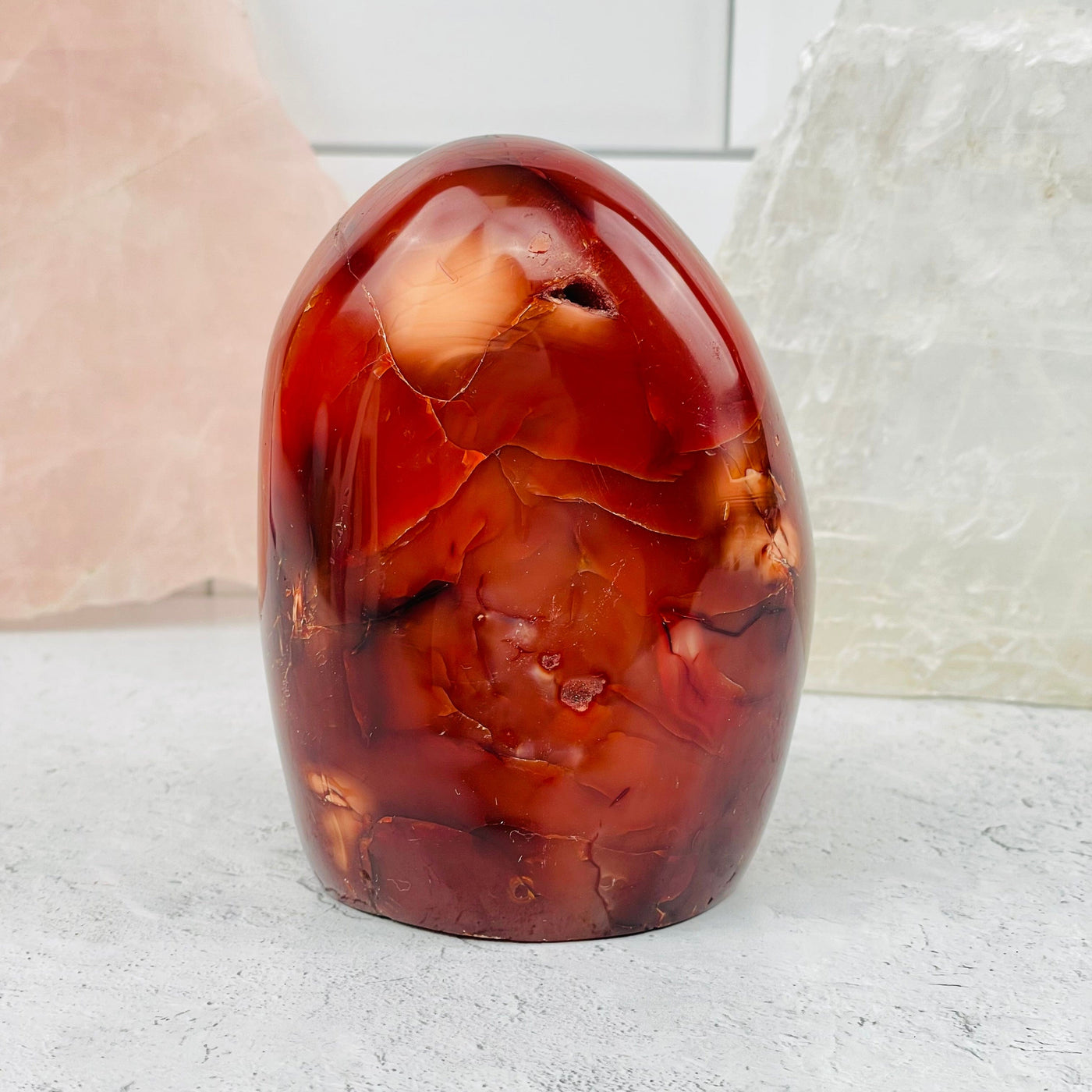 Carnelian Polished Cut Base displayed as home decor