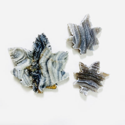 chalcedony leaf shapes on a table