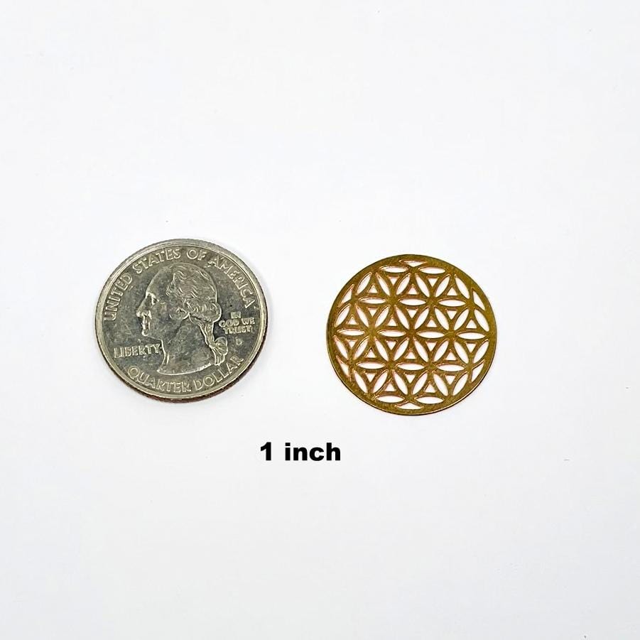 gold toned flower of life grid available in 1" size next to a quarter for size reference 