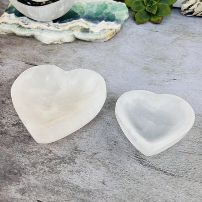 2 sizes of the Selenite Heart Bowls and Charging Station