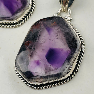 close up of the details on this Trapiche Amethyst with Matrix pendant