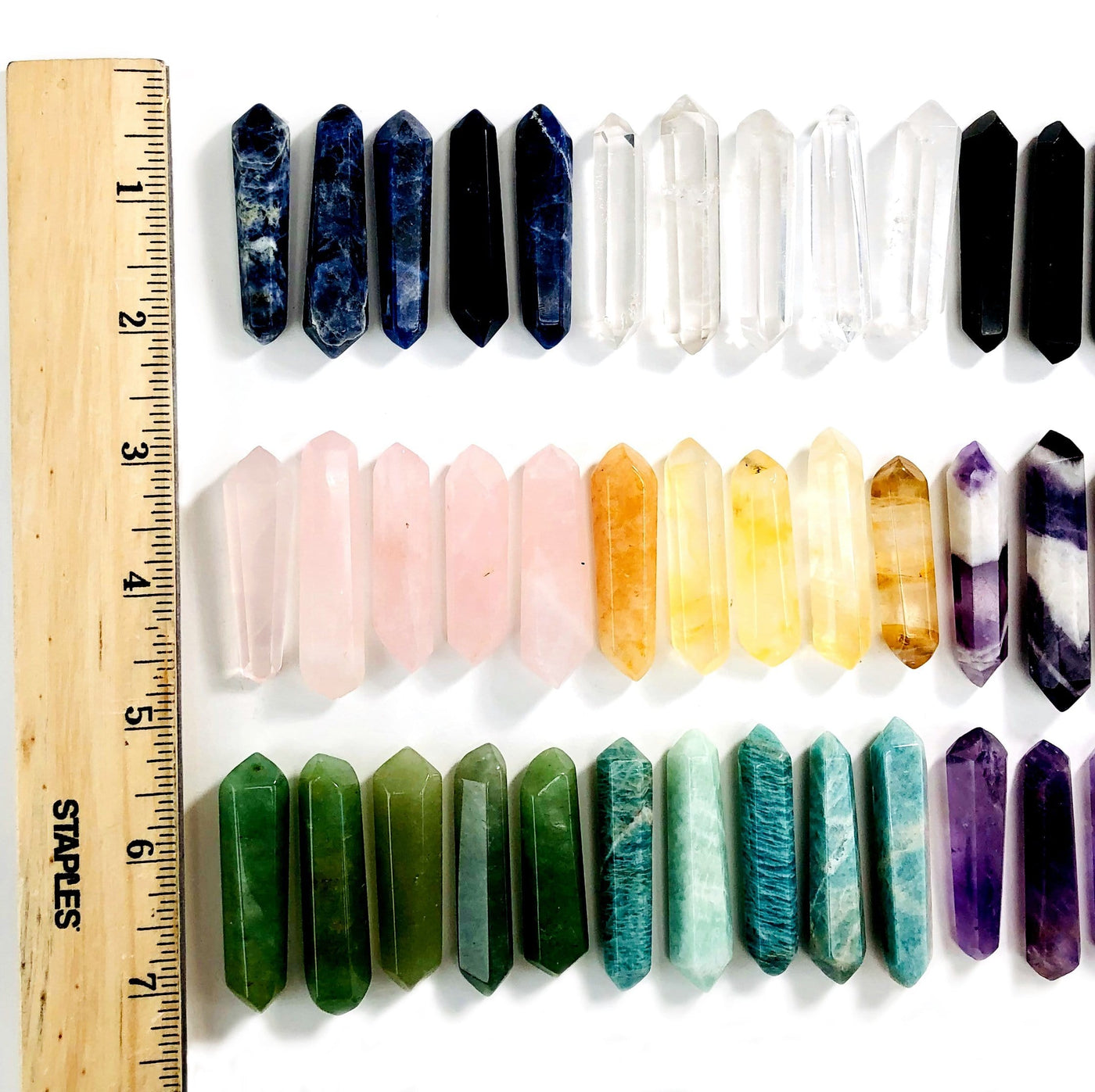 Gemstone Polished Bi-terminated Points next to ruler for size comparison