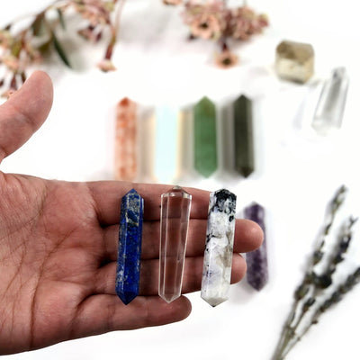 gemstones in hand for size reference 