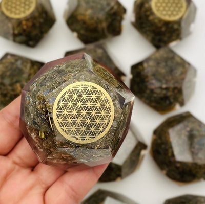 Orgone Energy - Labradorite with Gold Flower of Life Grid - Dodecahedron shaped--close shot view in hand for art and size comparison.