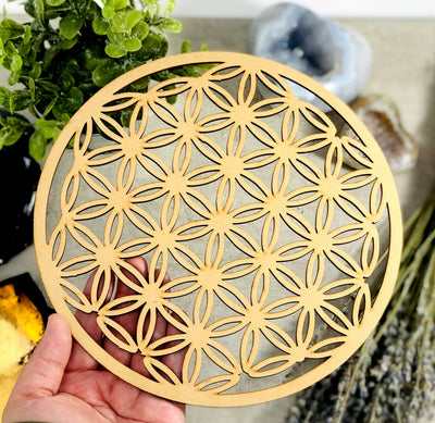 Crystal Grid Flower of Life Wooden Grid in a hand for size reference