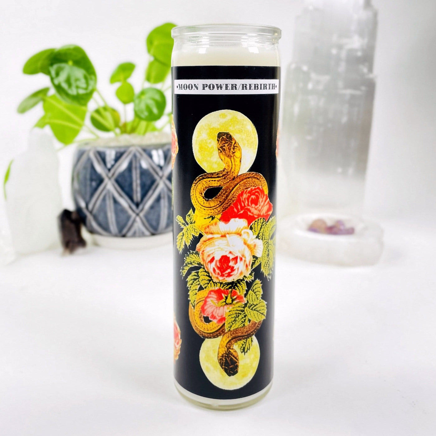 Moon Power/Rebirth Soy Candle with decorations in the background