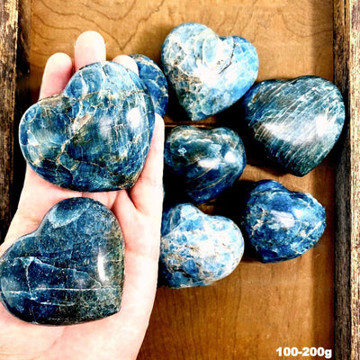 Blue Apatite Polished Hearts in hand by weight 100-200g
