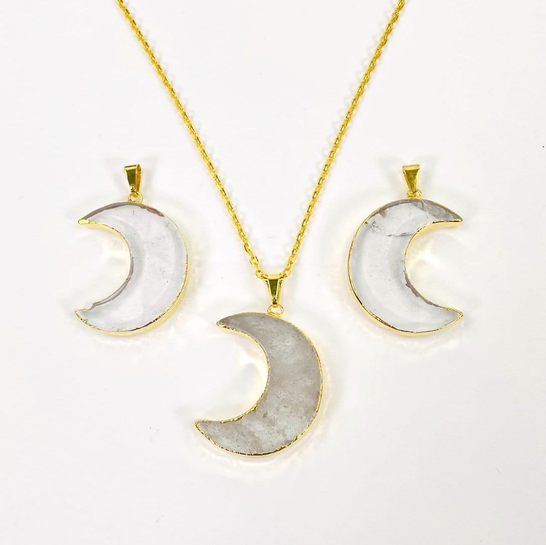 3 crystal quartz half moon pendants with one on gold necklace chain