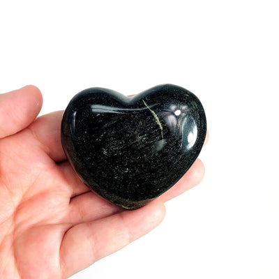 Gold Sheen Obsidian Heart in hand for size reference