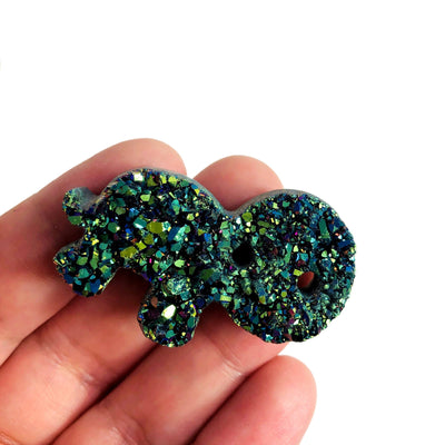 1 druzy Turtle Gemstone Cabochons in hand for size