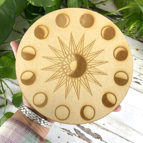 wooden crystal grid held in a hand