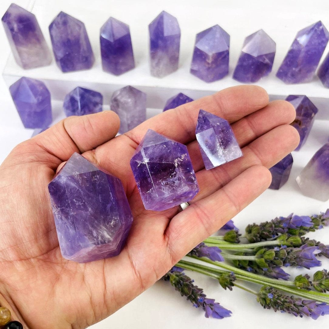 Amethyst Stone Towers in hand for size reference 