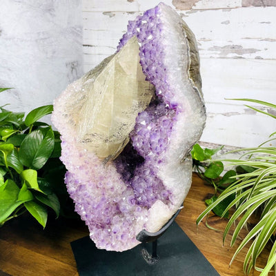 Amethyst Cluster with Calcite and Druzy on Metal Stand up close