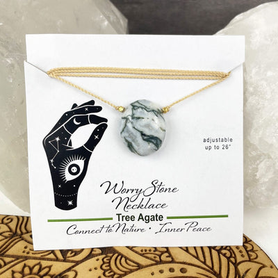 tree agate worry stone necklace on a card