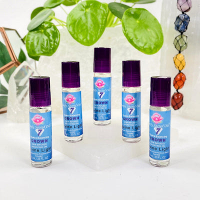 crown chakra oils - 5 on a table