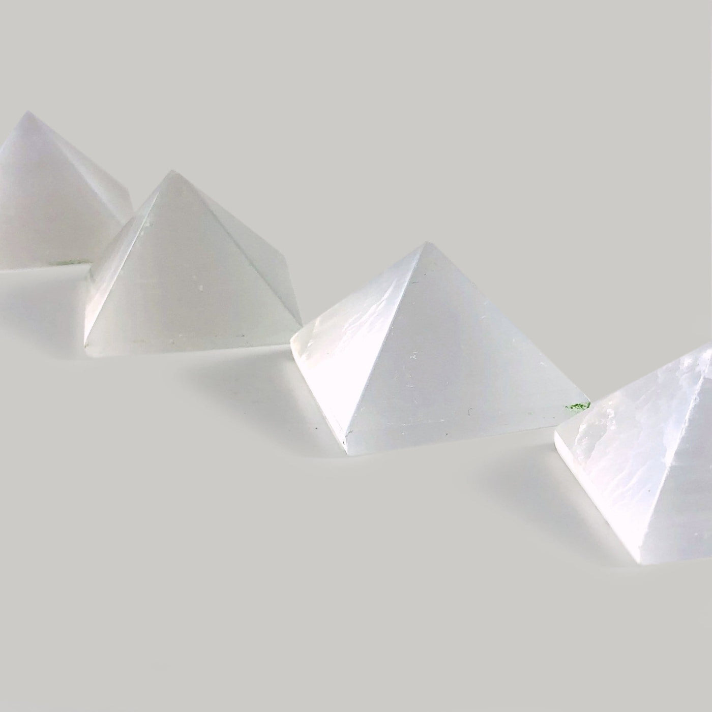 selenite pyramids on display for possible variations 