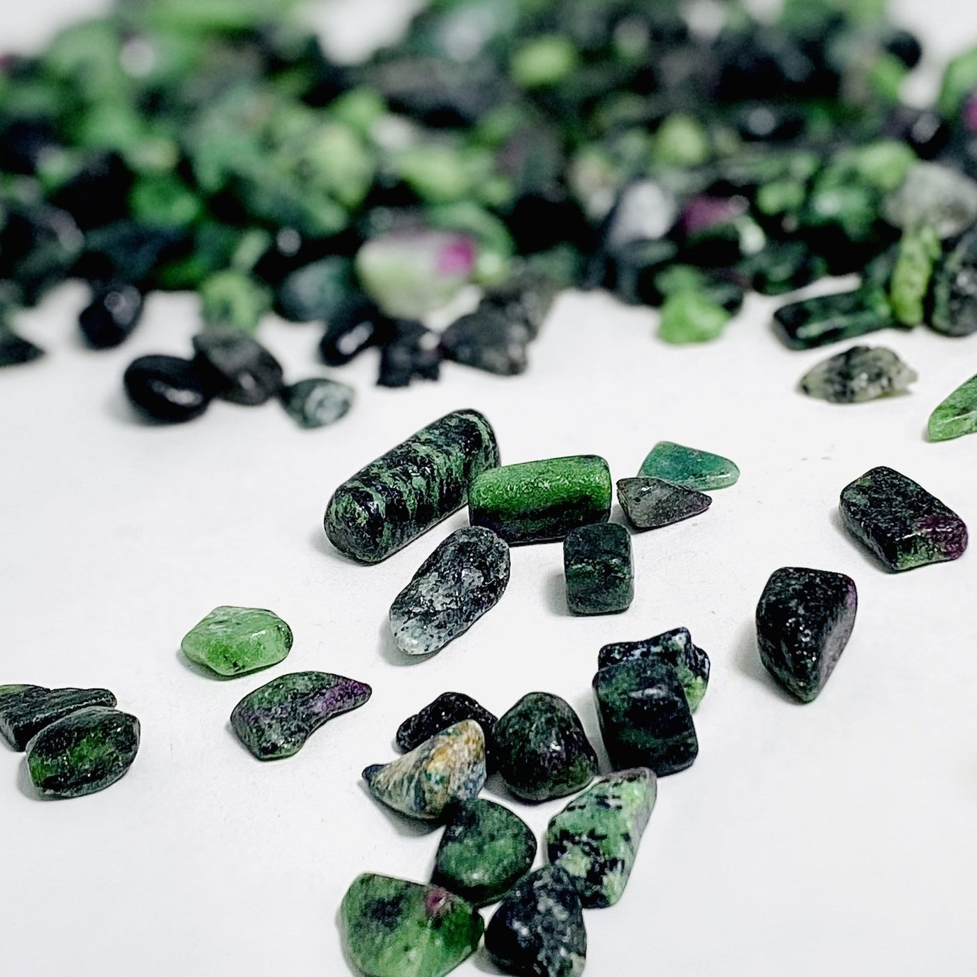 ruby zoisite chips on white background