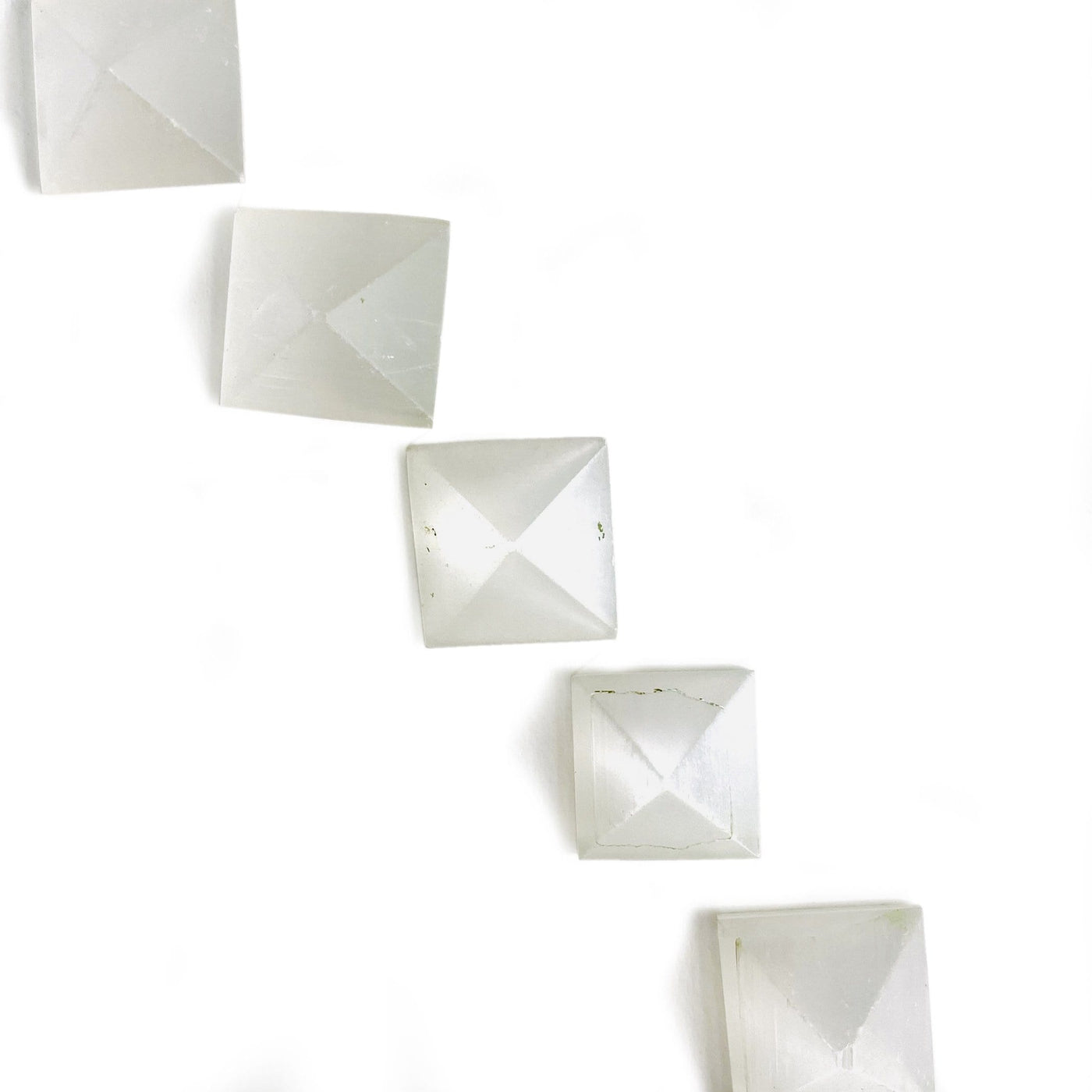 overhead view of selenite small pyramids for details and possible variations