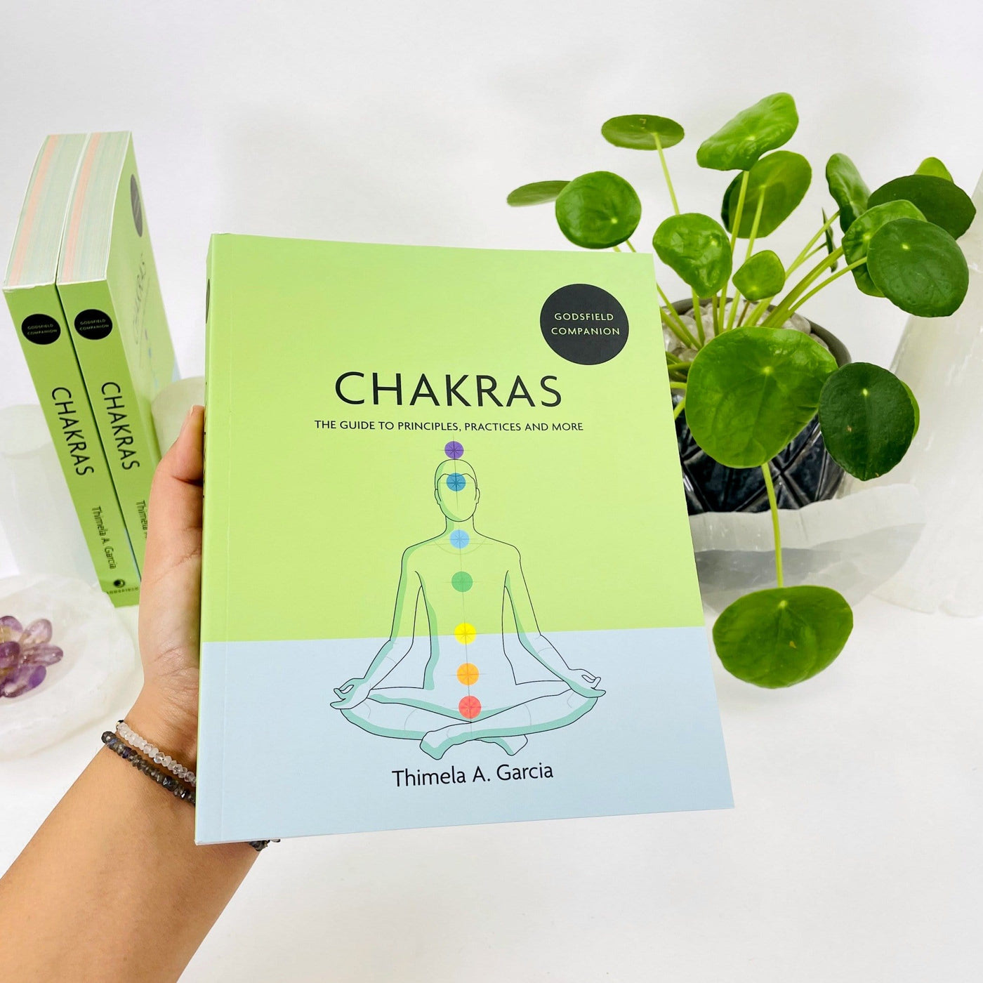 chakras book in hand for size reference 